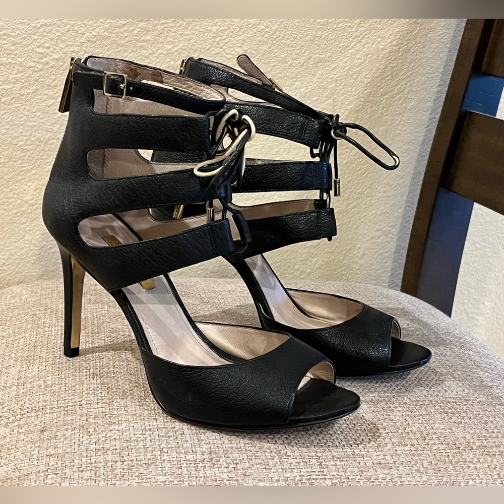 Louise et Cie black lace-up heels. Open toe, strappy caged design. Back zip. 8.5